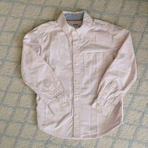 Carter’s light pink shirt